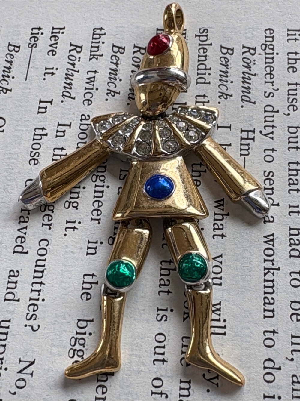 Vintage Articulated Gold-Tone Clown Pendant with Multicolor Glass Stones